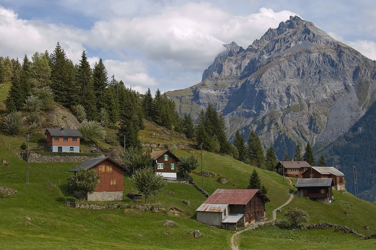 Alpine village and mountain range in the Arnisee region of Switzerland.